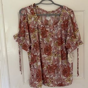 Naïf Brand Ladies Top.  Size XL . Ruffled sleeves.  Fits more like a Large.